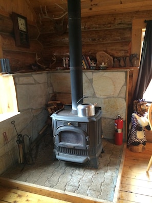 wood burning stove to take off the chill. But not necessary for heating cabin