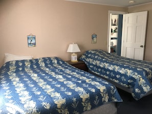 Another view of the bedroom off of the living room.