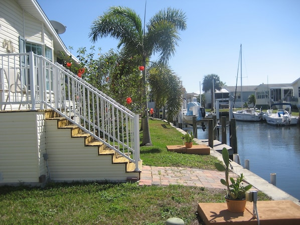 Back of House. Relax and sit in Lanai or on the balcony with 2 chairs.

