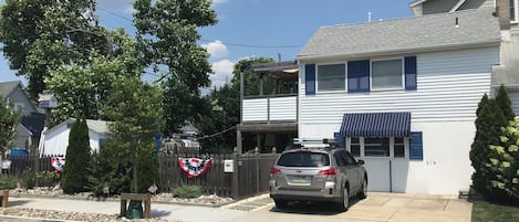 Second street view with one car parking
