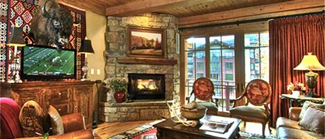 Enjoy a truly Western experience in our buffalo room-- stone fireplace and views
