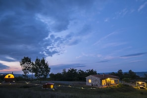 Evening view with Sauna, hot tub, house, pergola and bocce court