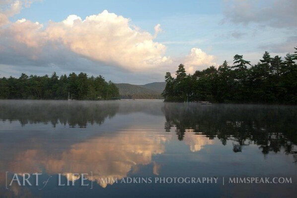 The view across the lake of the Squam range mountains from "Camp Kusumpy",