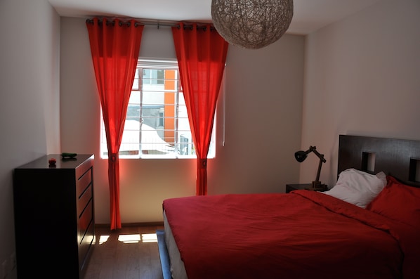 First bedroom with queen bed