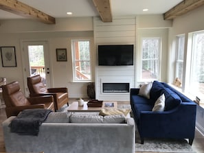 Family room with access to deck  and large windows