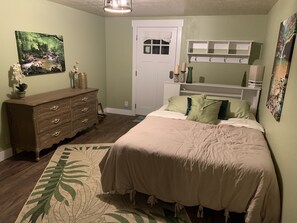 Private entry with mud room space for coats and shoes, Queen bed, large dresser