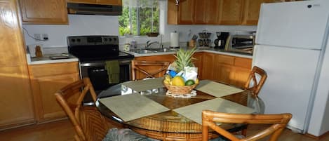 Kitchen & dining space. Equipped generously for maximum 2 people on vacation.