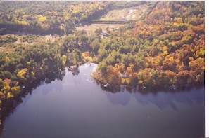 Arial view of property's point on beautiful Johnson Lake. 