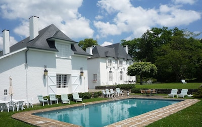 The converted Winery, Manor House and pool.