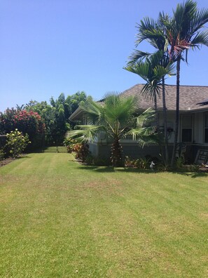 Short walk in the back yard to your waterfall pool - all ready to jump in