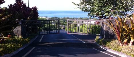Kahakai Estates entry gate for your special stay Notice the beautiful ocean view