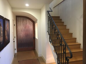 Entryway and door to master suite