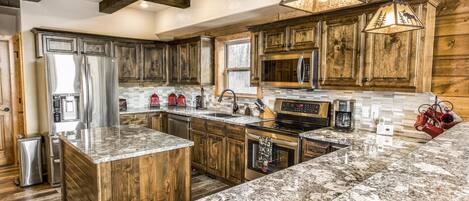 Gourmet kitchen with granite counter tops and stainless appliances!