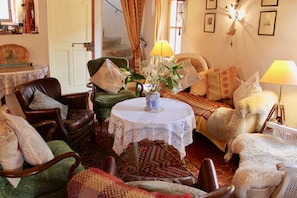 Living room with original 17th century staircase