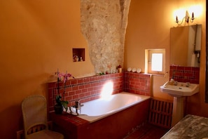 Enjoy a
candle lit soak
in a large bath