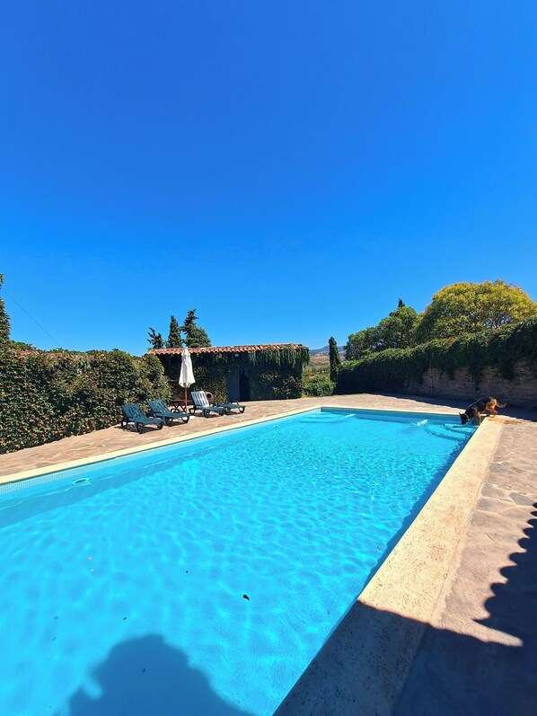 Our picturesque private pool with garden and stunning views
