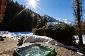 Hot tub with mountain views