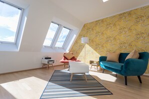 The sofa is for 2 persons and 1 comfortable easy chair