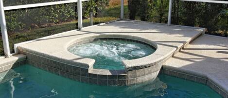 Enjoy a day away from the parks around this crystal clear private pool and spa.