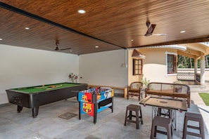 Play pool table, carrom and foosball with your friends