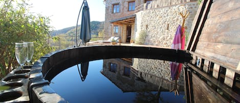 Private hot tub; comfortably takes 6 adults. 