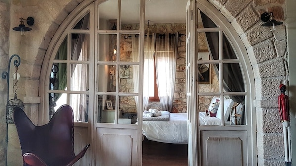 bedroom #2 fitted with a wooden hanging bed 