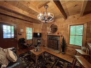 Living room with wood fireplace 