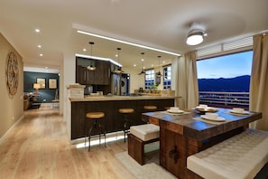 Open Dining Room, Kitchen and Balcony with view of the valley.
