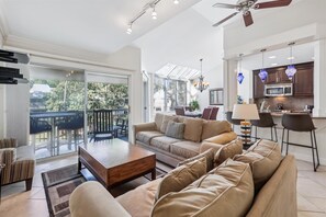Living Area with Balcony Access at 711 Barrington Park