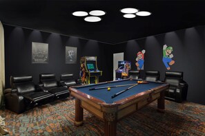 The game\theater room is designed with family fun in mind. A place to let loose.