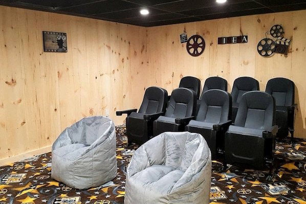 Large theater room w/theater seating & cupholders, surround sound, 80" TV, DVD 