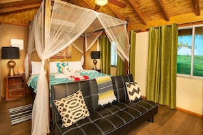 Master bedroom with large King sized four-poster bed & futon bed.