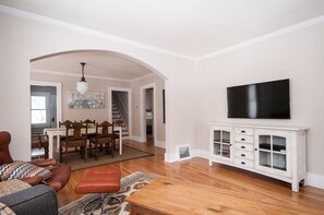 Main floor: Living room equipped with dvd player, cable tv, dvds, and more