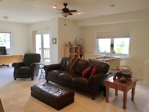 Fooseball, games and movies are in the living area.