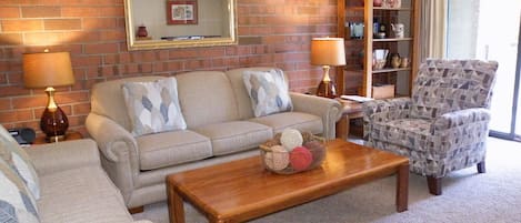 Living Room:  Q-sleeper sofa, love seat, wood fireplace, HD TV, DVD