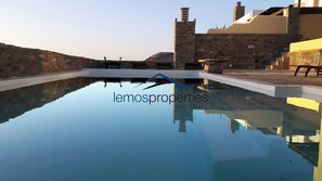 The swimming pool with a sea view