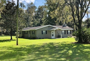 Covered portico at entry of house