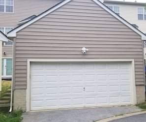 your own car garage right in front of your apartment door