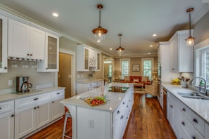 Kitchen open to living and dining area.