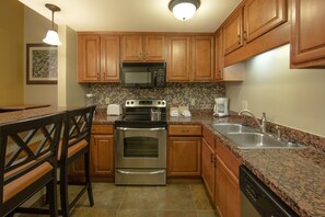 Prepare a meal in the equipped kitchen.