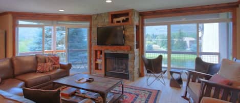 Main Level Living area. Gas Fireplace, TV.
Covered Deck with grill