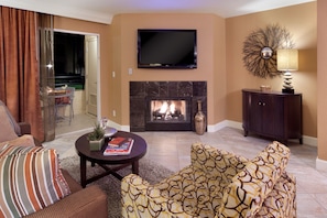 Take a seat in front of the fireplace and enjoy a movie in the living area.