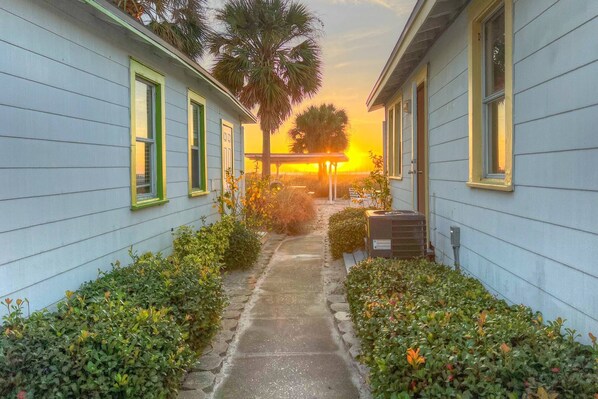 TWO BEDROOM BEACHFRONT COTTAGE - Feet in the sand directly outside your door!