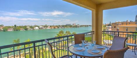 Private Balcony with Waterfront Views of the Bay and Outdoor Dining