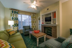 Take a seat in front of the fireplace and enjoy a movie in the living area.