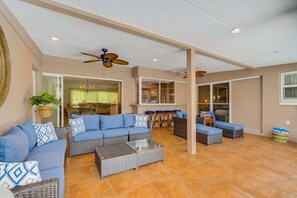 Large screen-in lanai with lots of additional seating off of the kitchen to enjoy the Florida Vibe