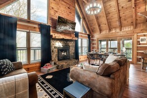 Main living room with wood-burning fireplace