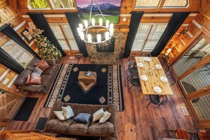 Main living room with wood-burning fireplace
