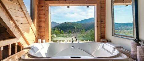 Soak away your stress and enjoy the stunning natural beauty from our jacuzzi with a view