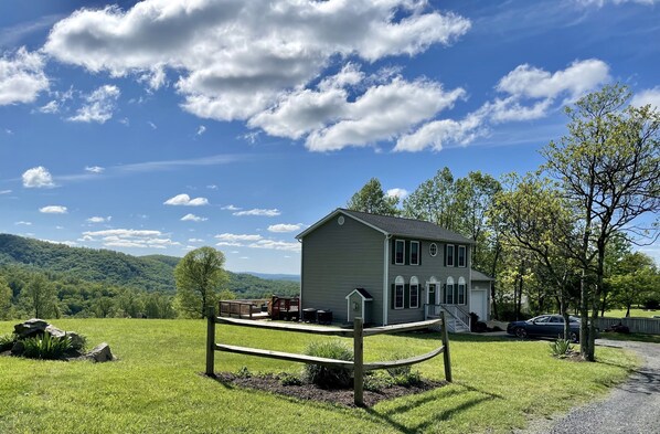 Outside including lawn and views